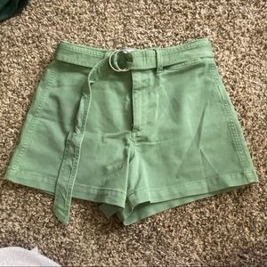 Green high waisted shorts with matching belt